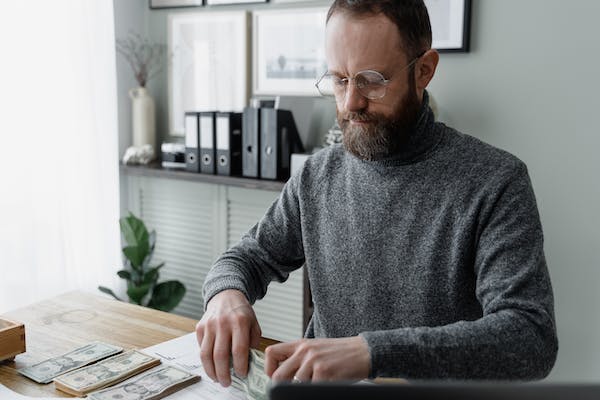 A man counting money