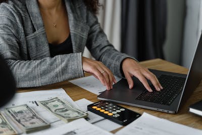 A woman calculating her money